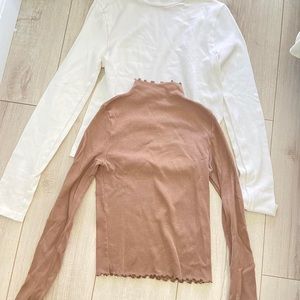 coffee and cream colored long sleeve turtle neck tops